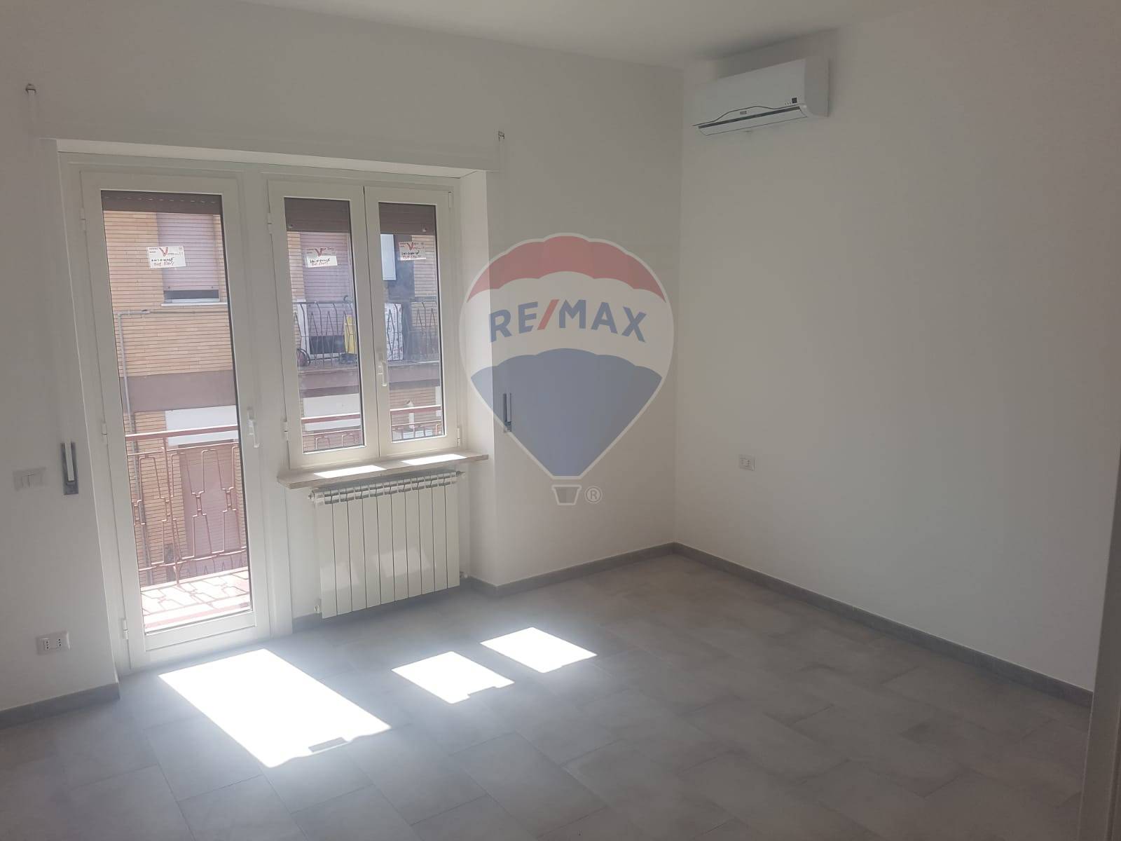  roma affitto quart:  re/max titanus